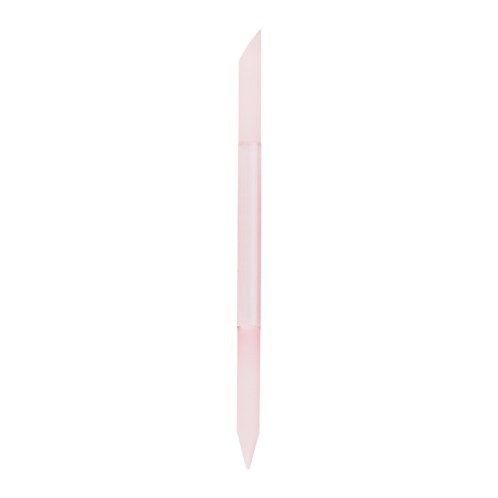 The glamnetic 2-in-1 Cuticle Pusher features a pale pink, double-ended design with a pointed tip and an angled, flat tip—ideal for nail maintenance and manicure routines. Shown vertically against a white background.