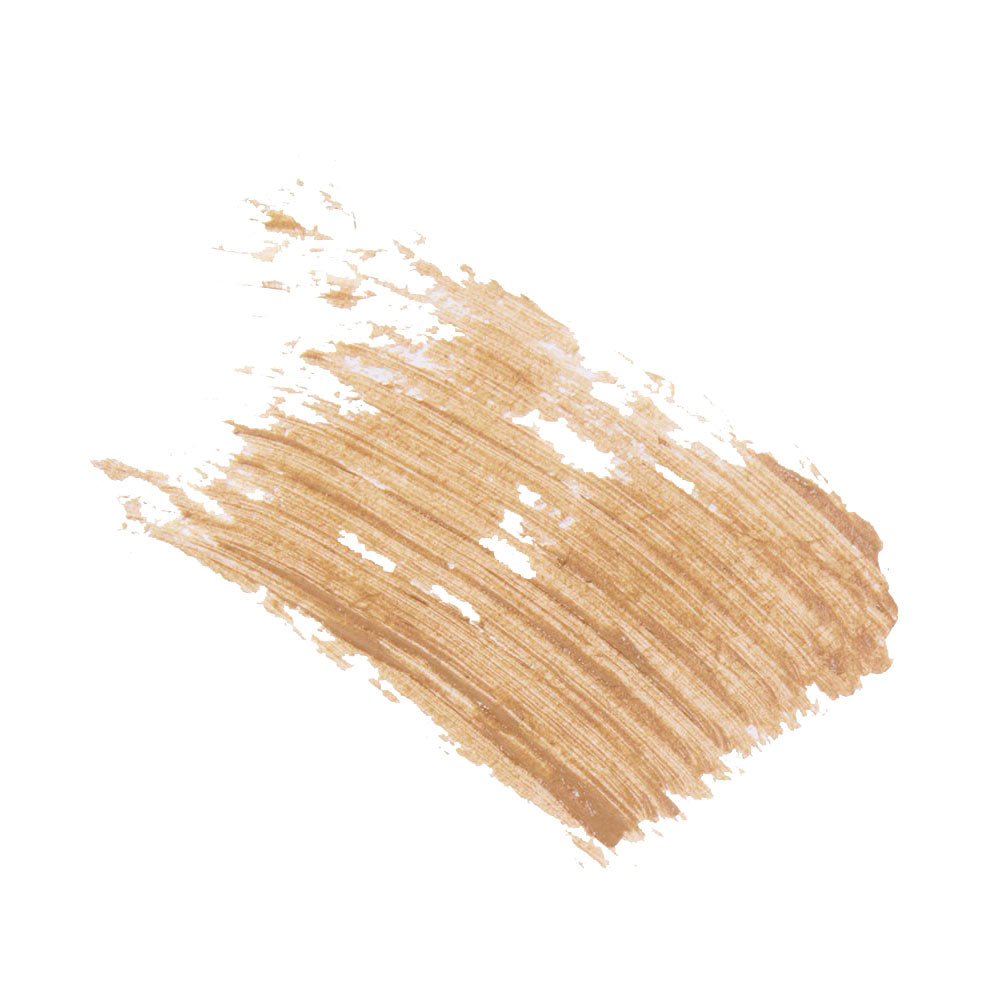A broad, textured stroke of shimmery light brown makeup—created with glamnetics 3-in-1 Brow It All—sweeps across a white background, featuring visible brush bristle lines and uneven edges for a natural finish.