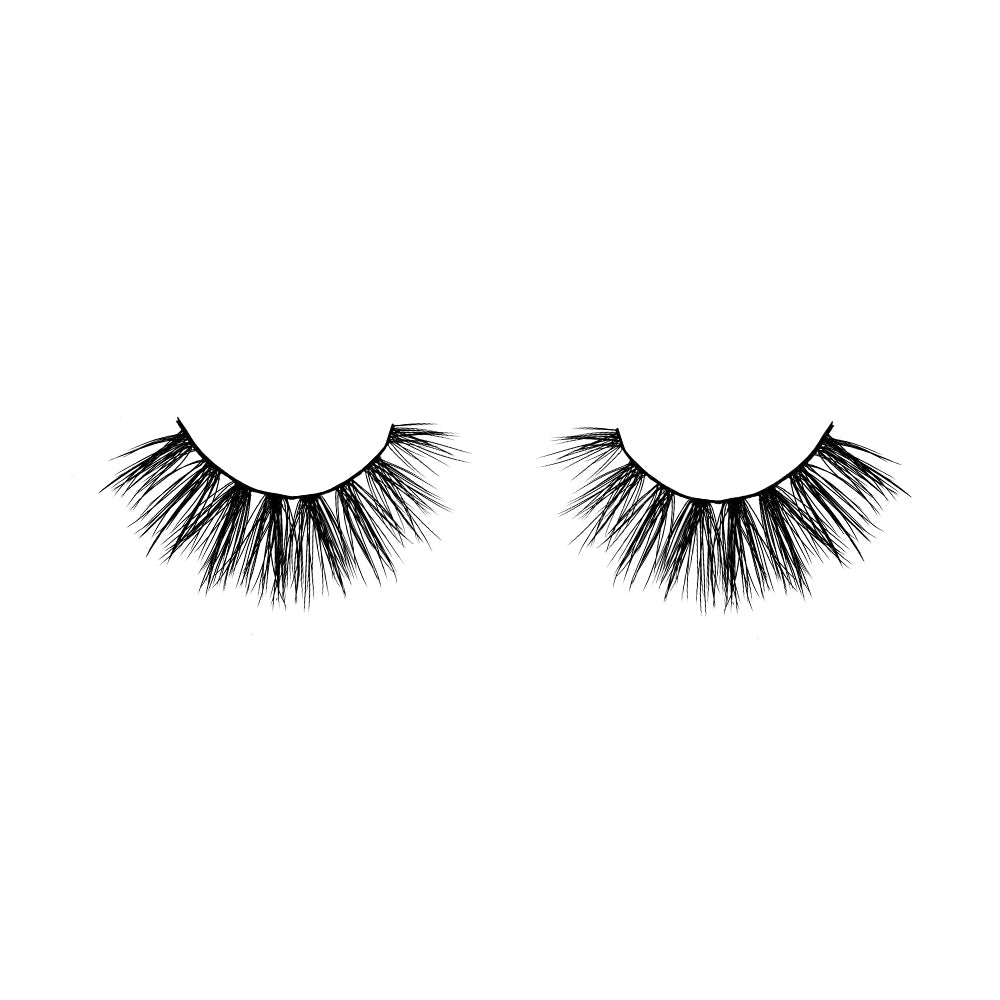 A pair of glamnetic Babygirl vegan false eyelashes featuring thick, long, wispy black strands in a natural curved shape—reusable and displayed against a white background.