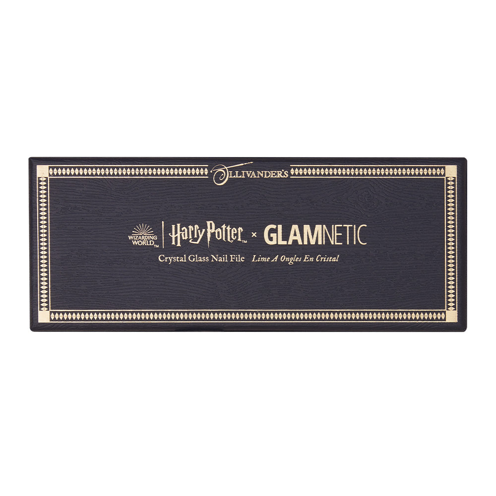A rectangular black box with gold accents features the glamnetic logo and is labeled Harry Potter™ Crystal Glass Nail File in English and French.