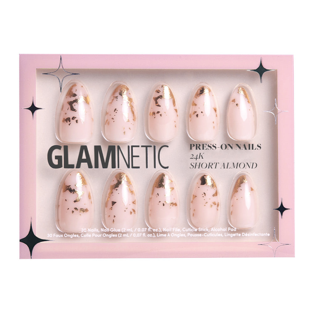 The glamnetic 24K set includes 30 short almond press-on nails in pink with a nude base and gold foil accents, plus nail glue, file, cuticle stick, and alcohol pad.