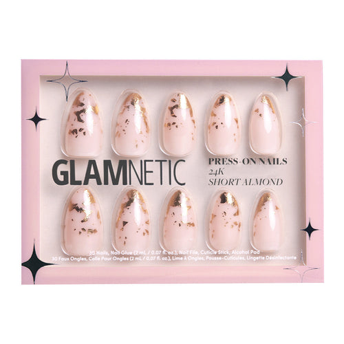 The glamnetic 24K set includes 30 short almond press-on nails in pink with a nude base and gold foil accents, plus nail glue, file, cuticle stick, and alcohol pad.