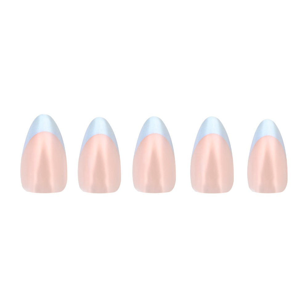 Five artificial nails from glamnetics Blueberry Icing set are shown in a row with nude bases, baby blue French tips, and a glazed finish, displayed on a white background.