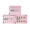 Three boxes of glamnetic press-on nails are displayed, featuring different styles such as Blush Crush in pink and brown shades, with Short Oval and Short Almond shapes, all in signature pink packaging.