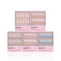 Five boxes of glamnetic Anns Bridal Edit press-on nails are arranged in two rows, showcasing assorted shapes and colors including pink, nude, light blue, and French tips. Each box holds 10 nails in a tray—ideal for everyday or bridal looks.