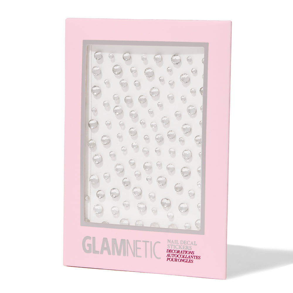 A box labeled glamnetic holds A Gem Nail Decal Stickers, arranged neatly on a white background—ideal for use with a UV Gel Top Coat for a flawless finish.