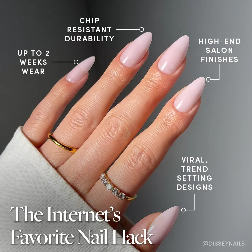 A hand flaunts glamnetic’s Blush Blanket Press-On Nails in long pale pink almond shapes. Get up to 2 weeks wear, chip resistance, high-end salon finish, and viral vegan cruelty-free nails.