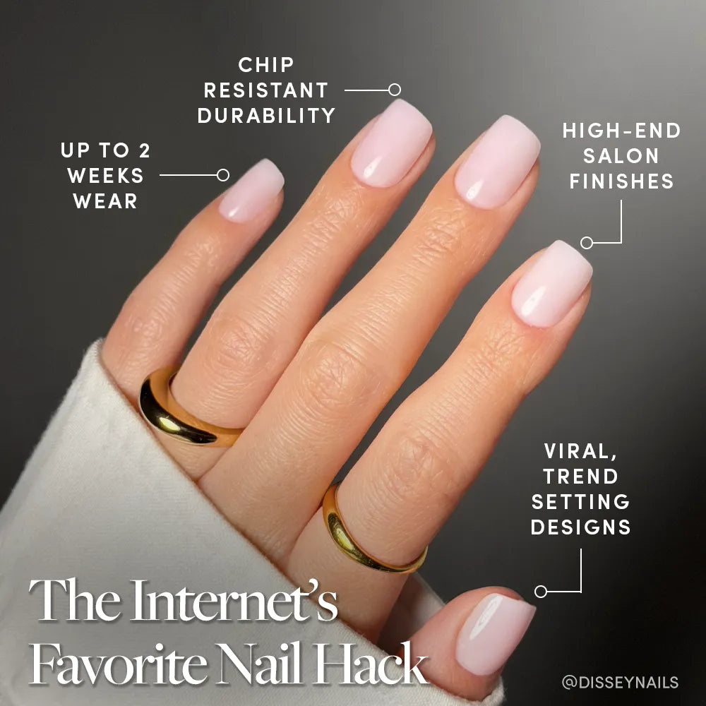 A hand with light pink, short squoval nails in glamnetic’s Soft Girl wears two gold rings. Text highlights salon-quality, chip-resistant durability, high-end finish, viral designs, and up to two weeks of wear.