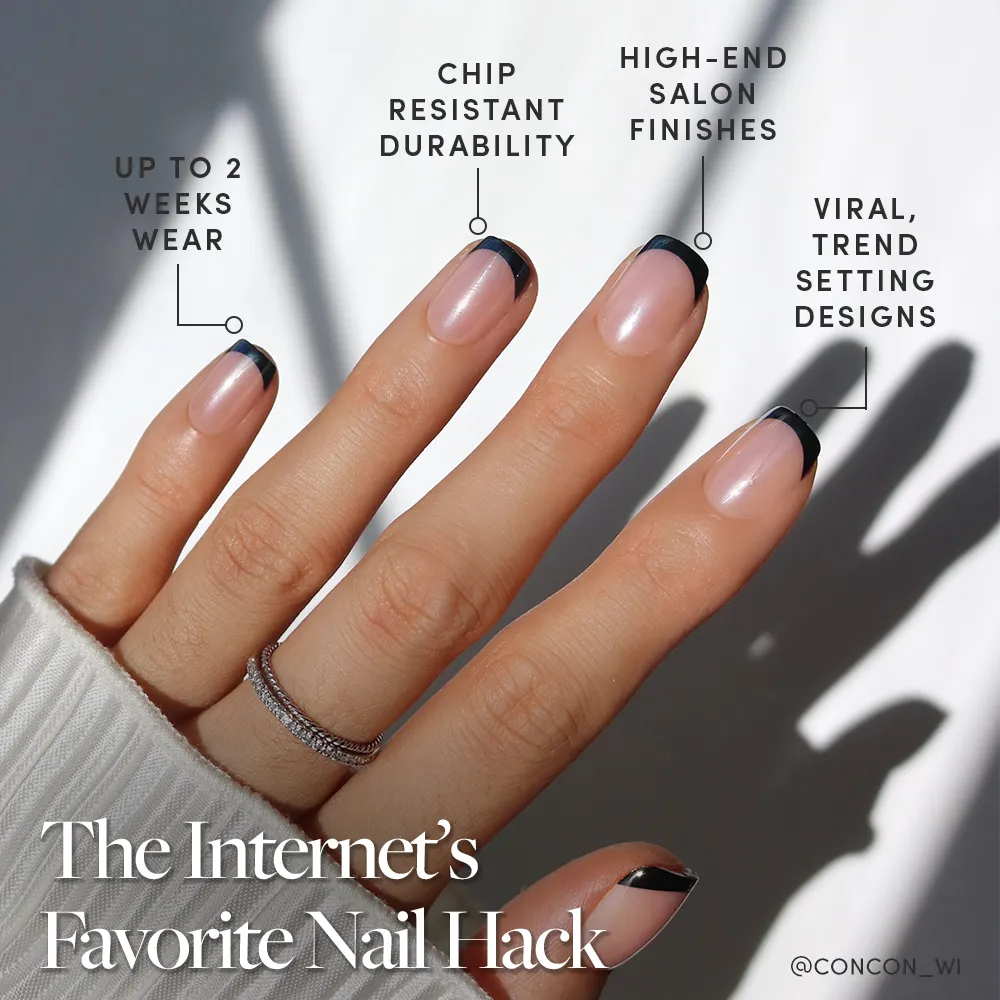 A hand with a black French manicure features Glamnetic Squid Ink Press-On Nails, showcasing glossy glazed tips. Enjoy chip-resistant, salon-quality nails with up to 2 weeks’ wear and on-trend, viral designs—the Internet’s favorite nail hack.
