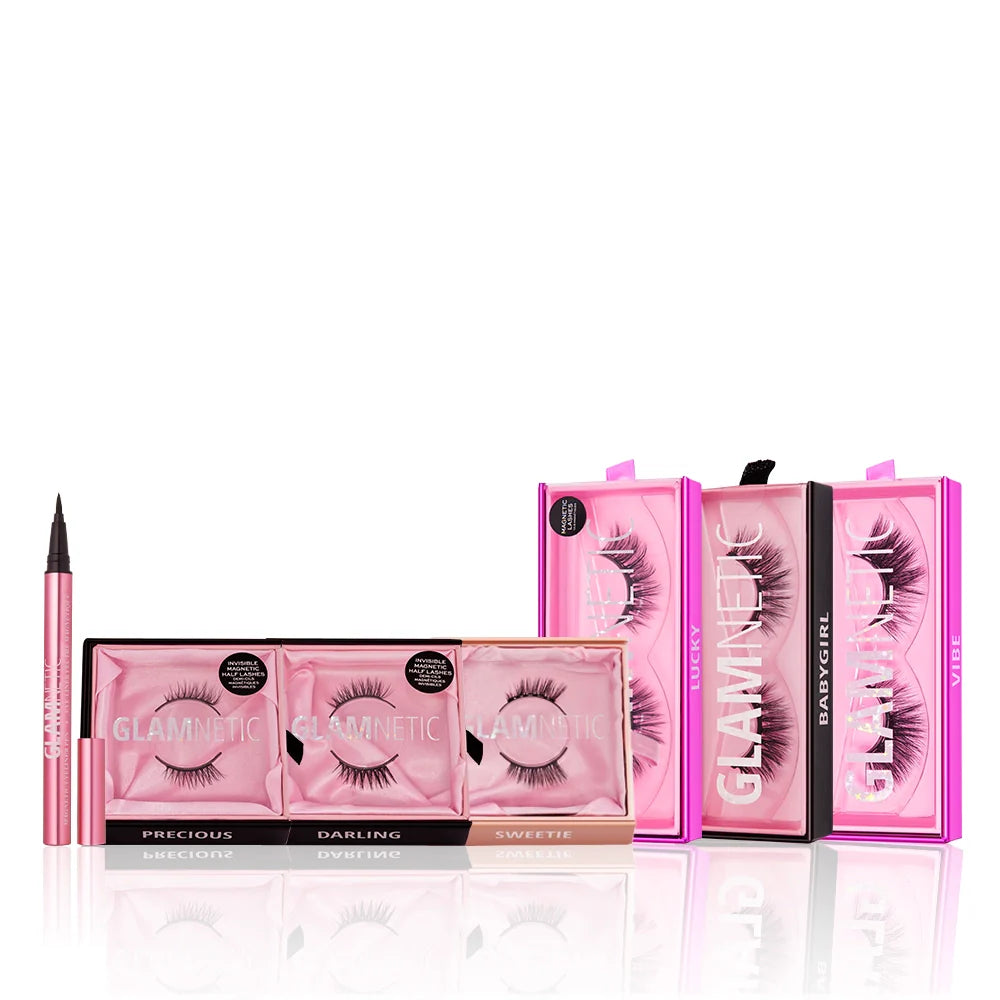 The glamnetic Lash Out Loud set includes three reusable magnetic lashes, two large single lash boxes, and a pink eyeliner pen—all in stylish pink packaging and arranged on a white background.