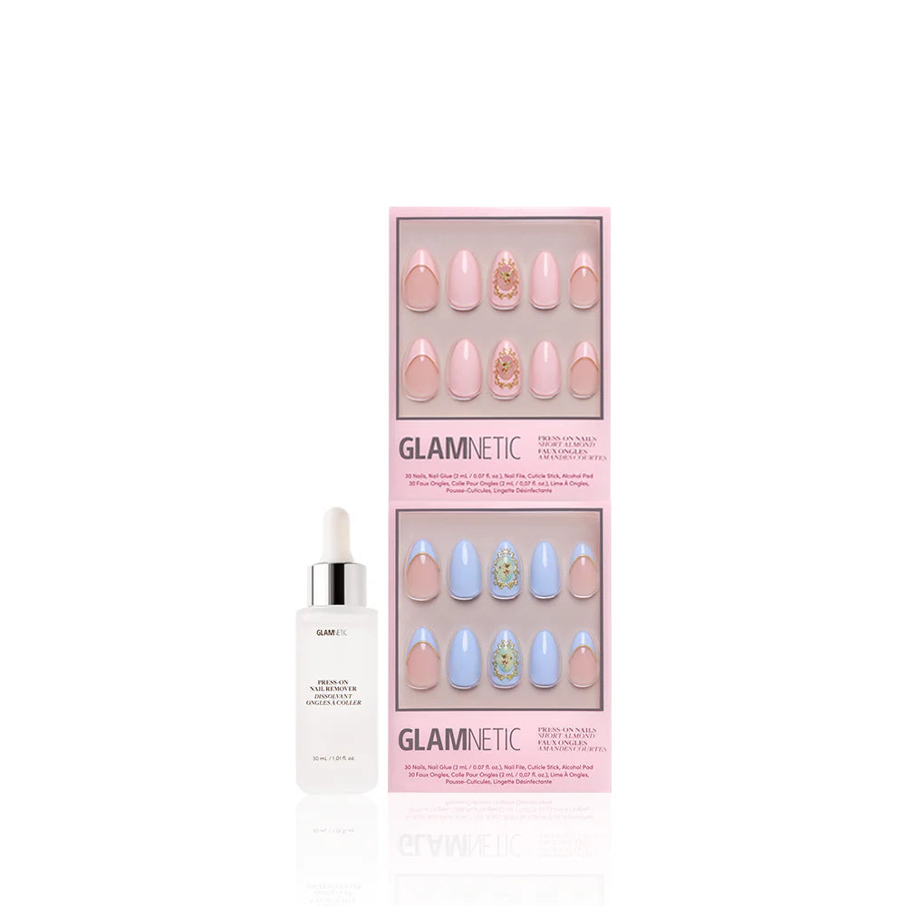 A bottle of nail glue and two sets of Glamnetic Heaven Sent almond press-on nails in a pink box, with pastel pink and blue cherub designs and 3D gold accents, shown on a white background.