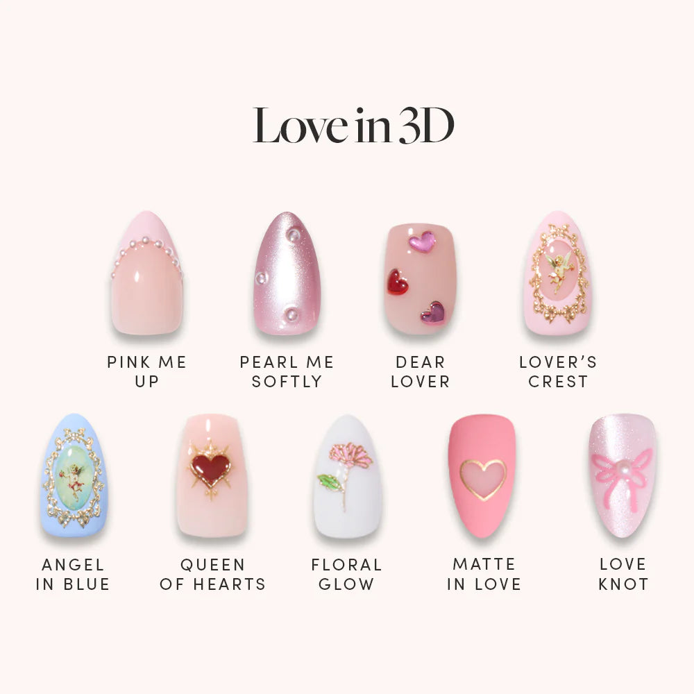 Love in 3D by glamnetic features nine almond artificial nails with romantic 3D art—pearls, hearts, flowers, and bows in pastel pink, blue, and gold. Each set is uniquely named: Pink Me Up, Dear Lover, and Angel in Blue.