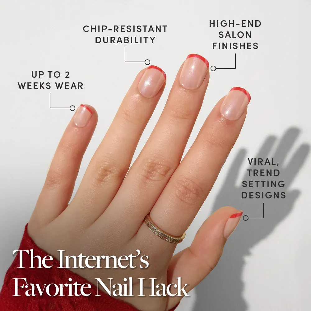 A hand with short, natural nails sports glamnetic’s Hotline Red micro French tips and a glazed finish. Enjoy up to 2 weeks’ wear, chip-resistant durability, high-end finishes, and viral trendy designs.
