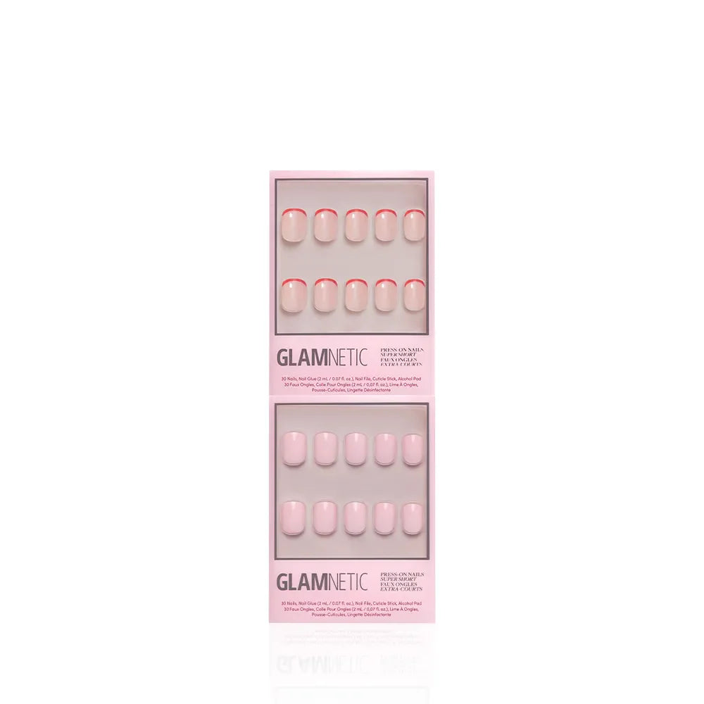 Two Glamnetic press-on nail sets, both in pink packaging: on top is the "Super Short & Sweet" set with solid light pink nails, and below is a pink set with red French tips—each neatly displayed in its box against a white background.