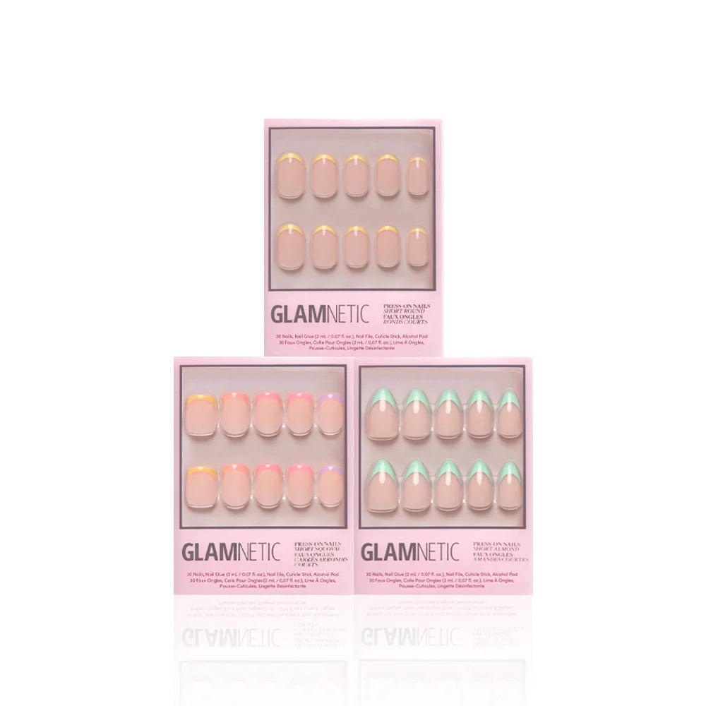 Three pastel-colored À La Ann press-on nail sets by glamnetic are shown in light pink Glamnetic boxes, featuring yellow, pink, and green French tips. Arranged in a triangle on white, they offer salon-quality durability.
