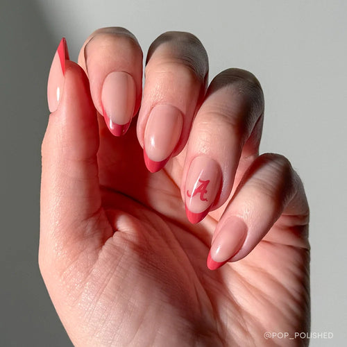 The glamnetic Alabama Crimson Tide Press-On Nail Set features almond-shaped nails with a pink nude base, red French tips, and a red “A” accent—perfect for spirited fans seeking a glossy, eye-catching manicure.