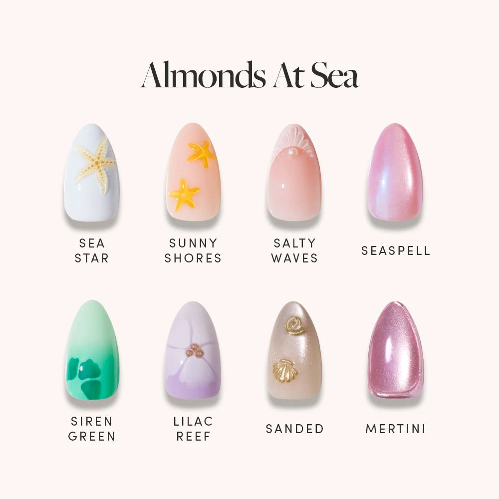 Glamnetic’s Almonds At Sea features eight short almond nails in pastel, ocean-inspired shades with 3D starfish accents for a whimsical beach look.