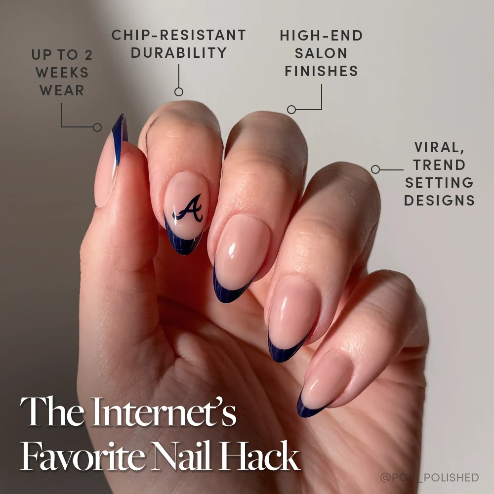 The glamnetic Atlanta Braves Press-On Nail Set features long, almond-shaped nails with navy blue French tips and an A design. Enjoy trendy MLB-inspired style, salon-quality finish, chip-resistant polish, and up to 2 weeks of wear.