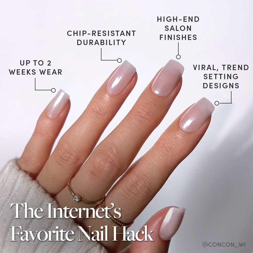 A close-up of a hand with medium square, glossy light pink Bailey nails by glamnetic, featuring a semi-transparent glaze. Enjoy up to 2 weeks wear, chip-resistant durability, salon-quality finish, and viral trendsetting design.