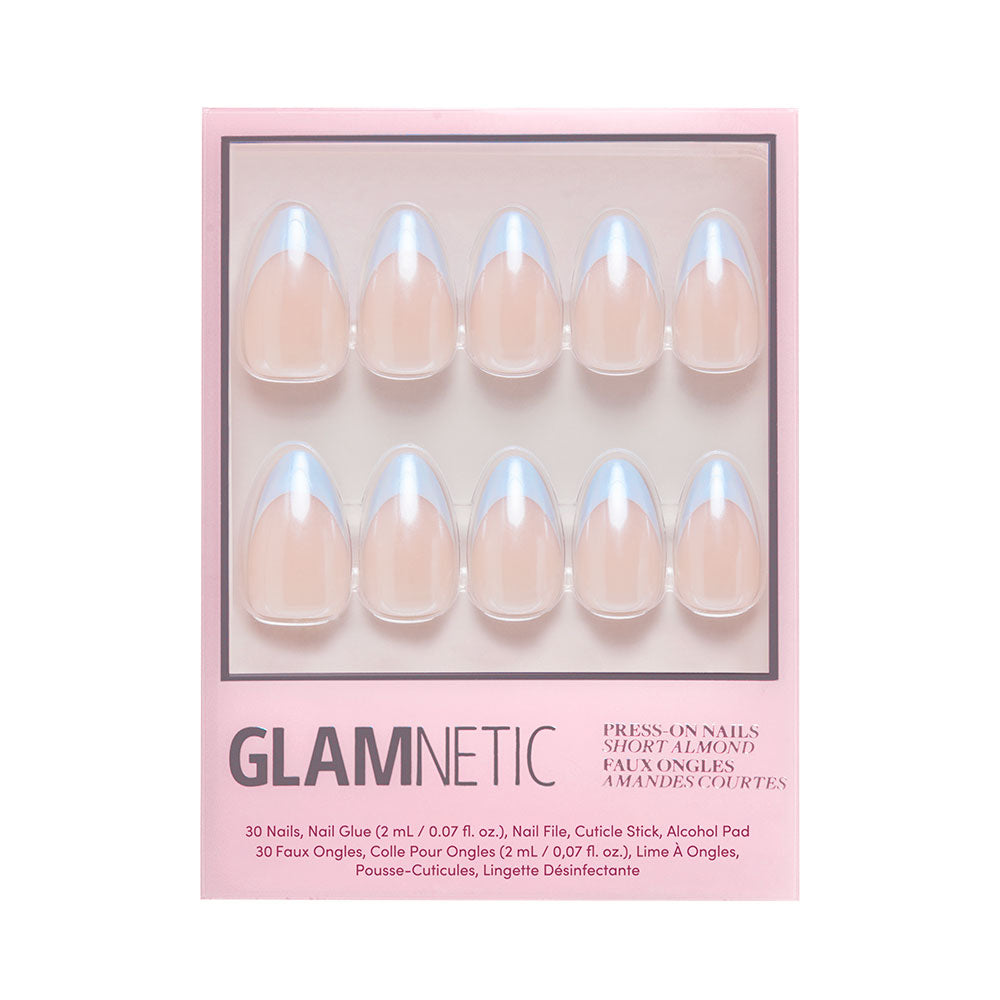 The glamnetic Blueberry Icing set includes 30 short, almond-shaped press-on nails in a natural nude with a glazed finish, plus nail glue and manicure tools—all in pink packaging. Perfect for achieving the Blueberry Icing look.