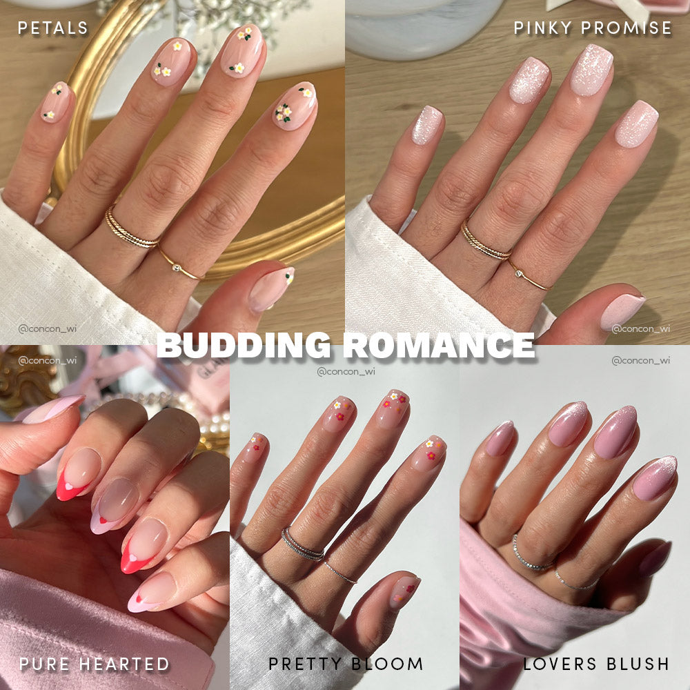 Six images of manicured hands display glamnetics Budding Romance press-on nails, with pink hues, French tips, and heart accents. Each short almond design has a unique name such as Petals, Lovers Blush, and Pretty Bloom.