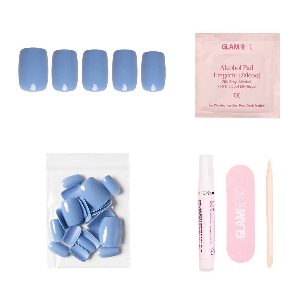 The glamnetic Cashmere Blue set includes vegan, cruelty-free short squoval nails, nail glue, extra nails, alcohol pad, pink file, and cuticle stick—all displayed on a white background.