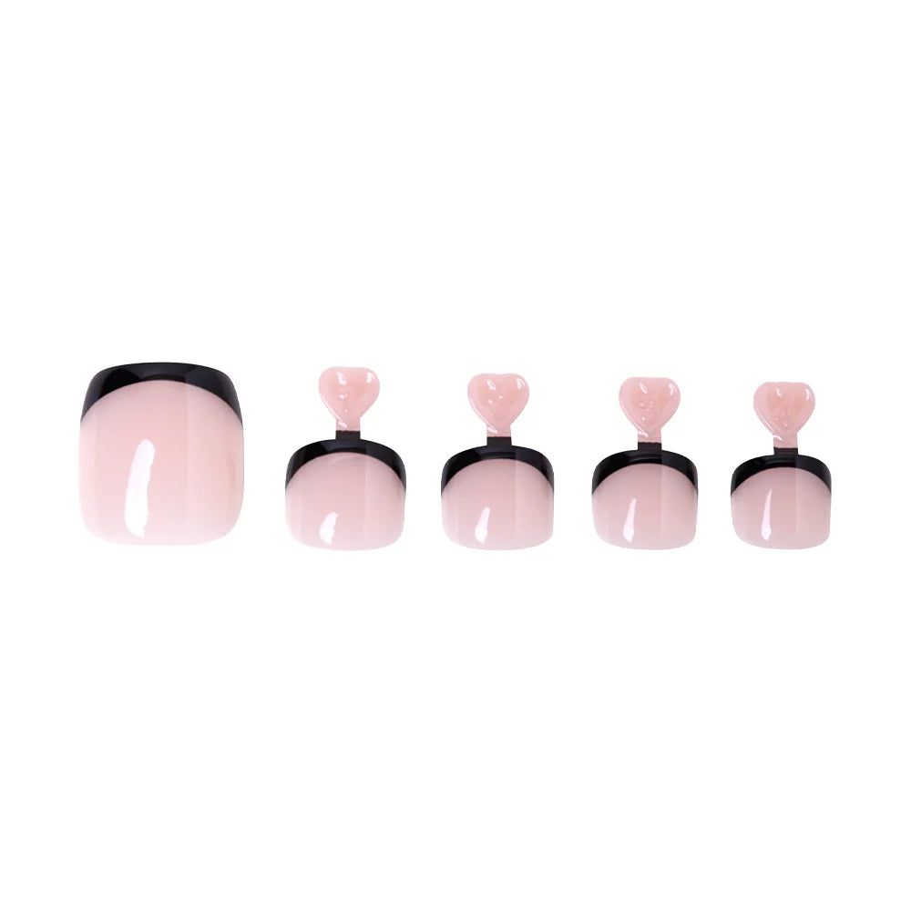 Display of a 5-piece set of pink Glamnetic press-on toenails with glossy black French tips.