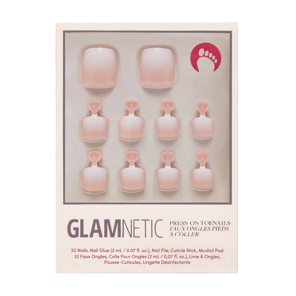 A box of Glamnetic press-on toenails in a peachy nude ombré design.