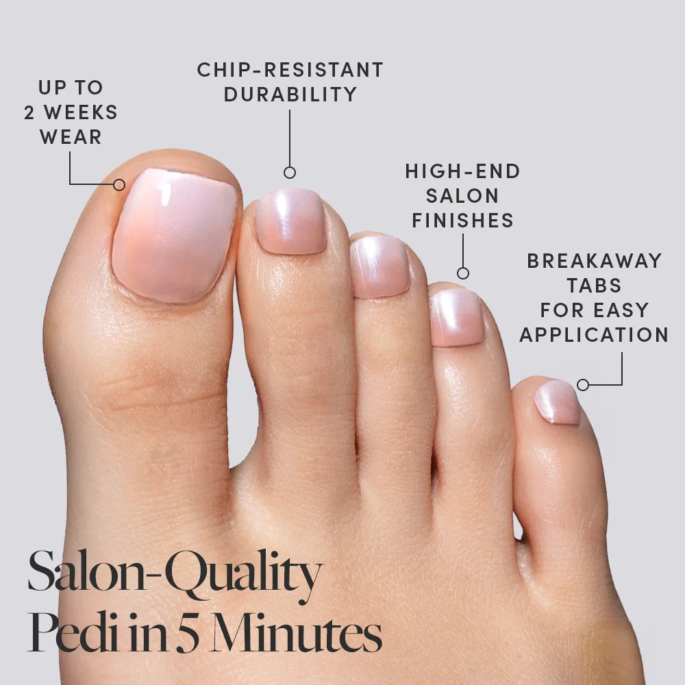 A foot showcasing pearly pink Glamnetic press-on toenails with callouts emphasizing 2-week wear, salon-quality finish, and easy application.