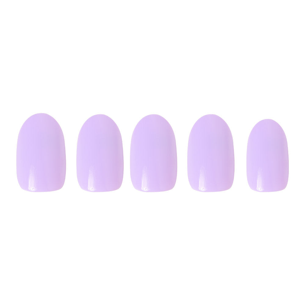Glamnetic’s Lilac set features five glossy pastel lavender press-on nails arranged in a row on a white background, offering subtle, floral-inspired elegance.