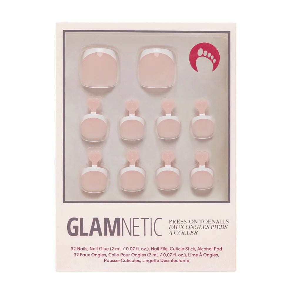 A box of Glamnetic press-on toenails in a soft beige nude tone with a touch of french tip.