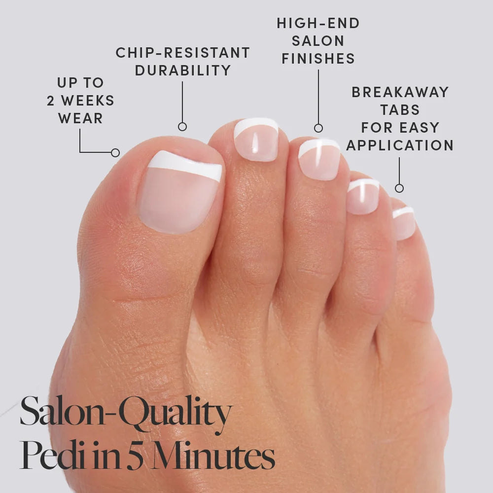 A clean French tip Glamnetic press-on toenail set shown on toes, with benefits like breakaway tabs and chip resistance noted.
