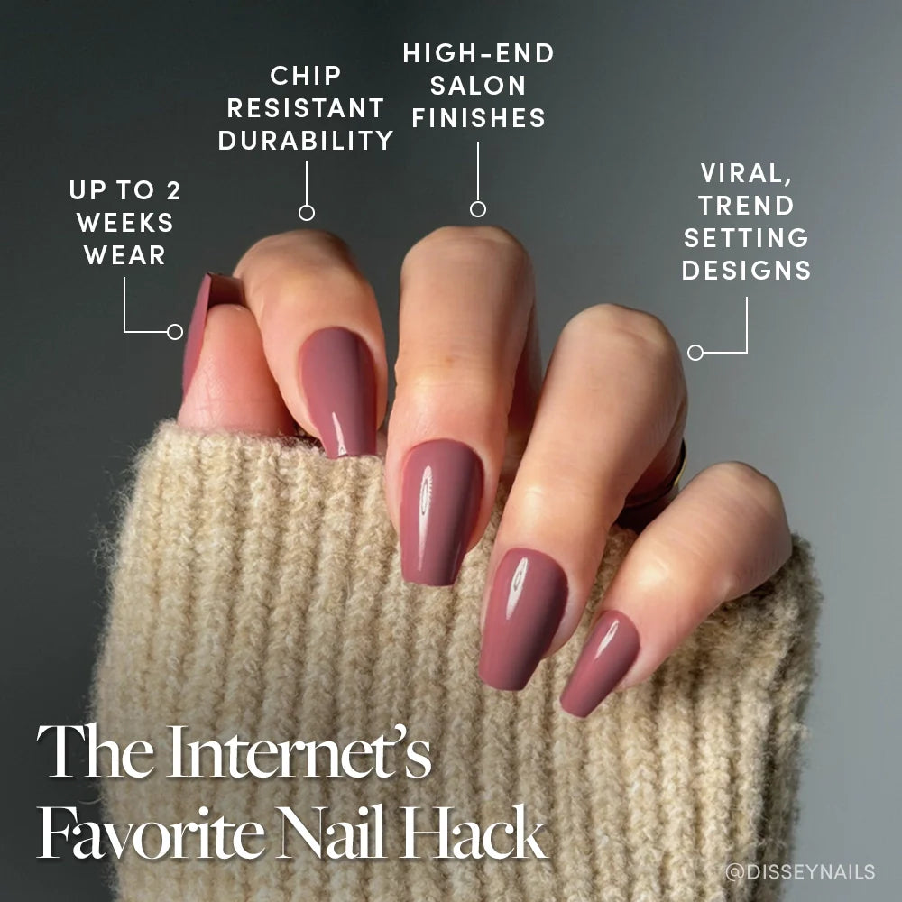 A hand with glamnetic’s Mauve Affair glossy, medium coffin fake nails is shown against a gray background, with text highlighting chip resistance, salon-quality finish, trendy mauve design, and up to 2 weeks of wear.