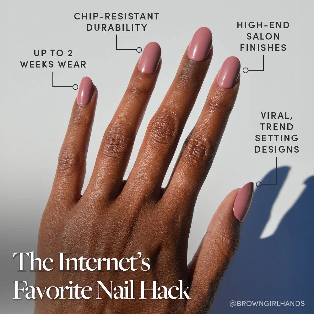 A hand with medium brown skin shows pink vegan, cruelty-free Mauve Mood nails by glamnetic. Labels highlight chip-resistant durability, up to 2 weeks' wear, salon-quality finish, and viral trendy designs. Text: The Internet’s Favorite Nail Hack.
