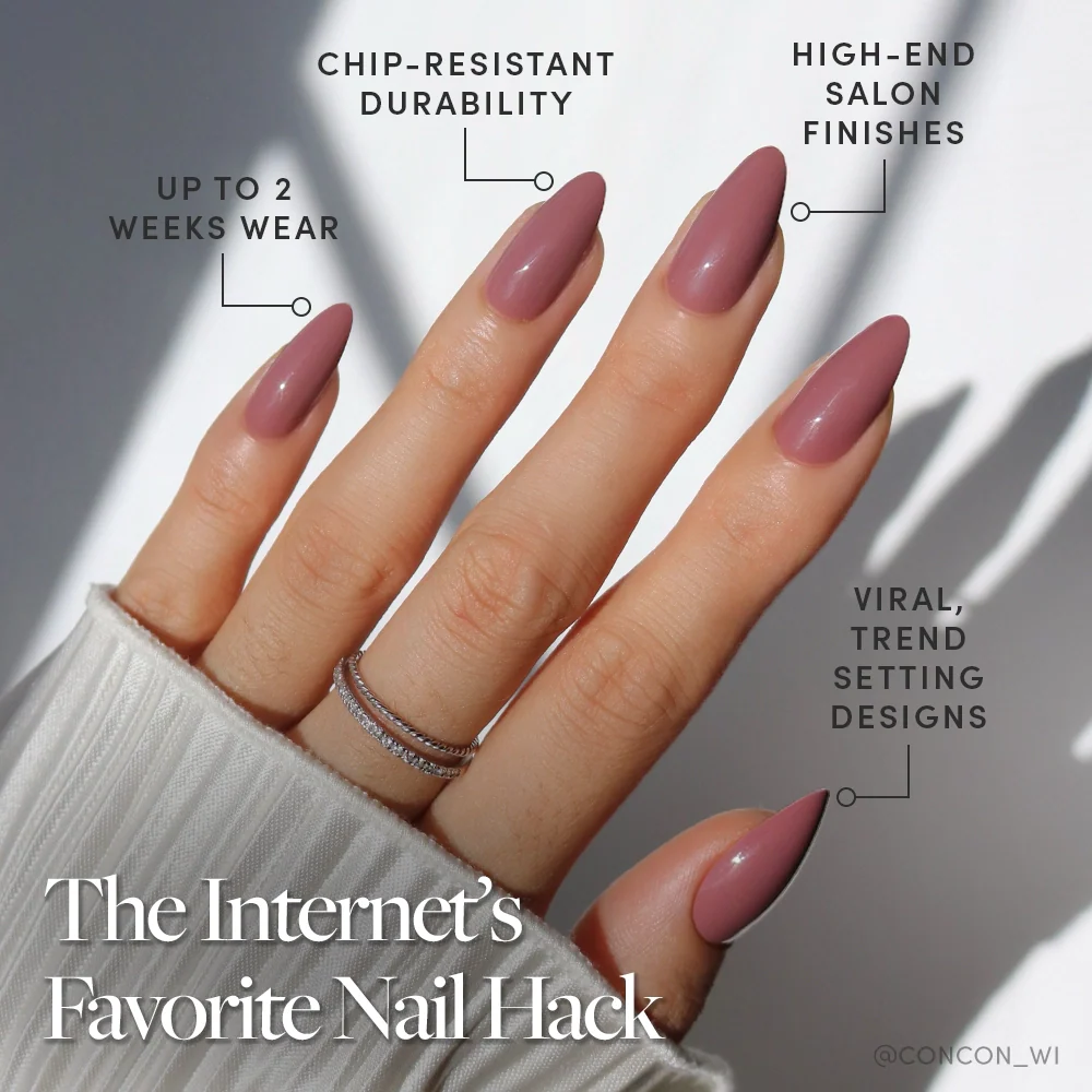 A hand wears glamnetic’s Mauve Wife almond-shaped press-on nails—long, glossy mauve with viral designs. Text highlights chip-resistant durability, salon-quality finish, up to 2 weeks’ wear. The look is accessorized with silver rings.