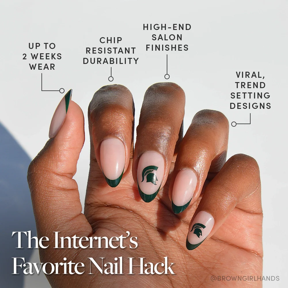 Show your Spartan pride with the glamnetic Michigan State Spartans Press-On Nail Set—featuring almond-shaped, nude nails with dark green French tips and helmet designs. Enjoy up to 2 weeks of chip-resistant, Spartan Strong style.
