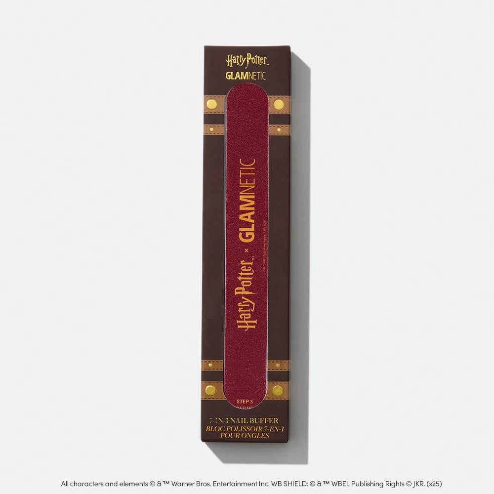 The Harry Potter™ x Glamnetic 7-in-1 Nail Buffer comes in maroon packaging with gold accents, displaying both brands’ logos and reads “Step 1: Nail Buffer” for salon-perfect nails.