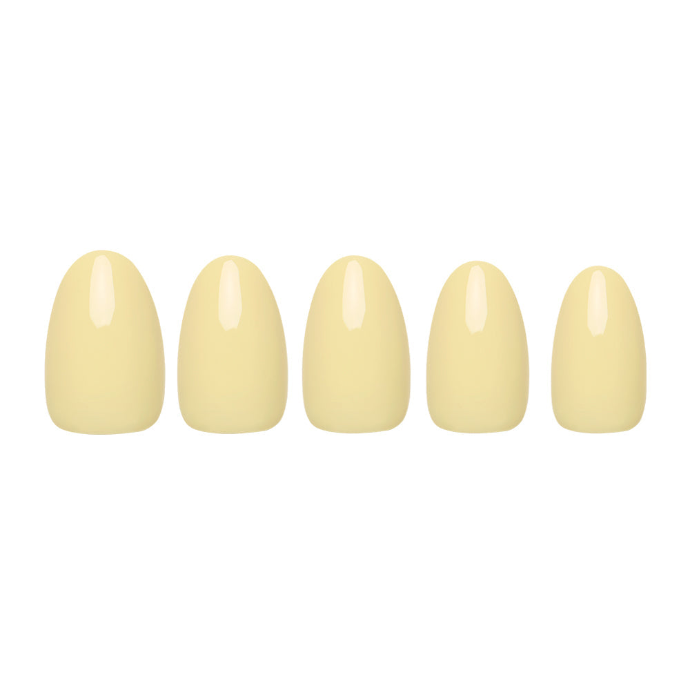 Five short, oval nails in glamnetics Pastel Yellow shade are arranged in a row on a white background, highlighting their glossy, salon-quality finish.