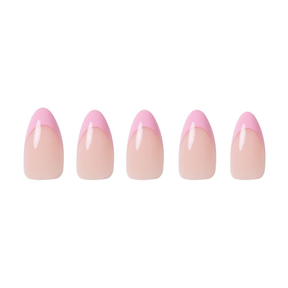 Five almond-shaped artificial nails from glamnetic’s Pink Macaron set, featuring glossy curved French tips, are arranged in a row on a white background.