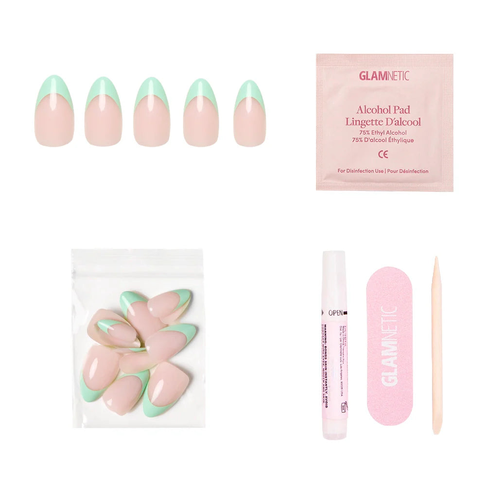 The glamnetic Pistachio Crème Press-On Nail Set includes pink French tip nails, an alcohol pad, extra nails in a pouch, a nail glue pen, a pink nail file, and a wooden cuticle stick—everything for salon-quality nails at home.