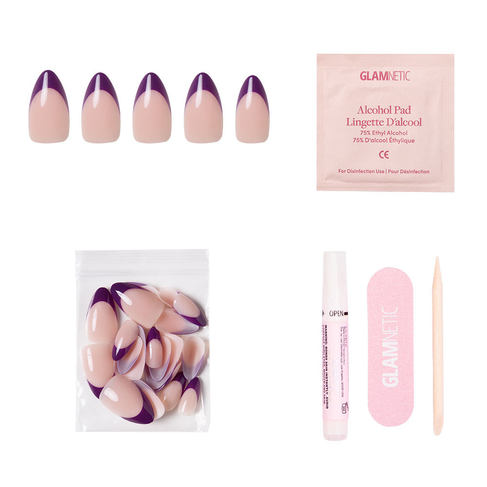 The glamnetic Plum Nail Set includes short almond nails with pink and dark purple French tips, extra nail tips, nail glue, a pink nail file, wooden cuticle stick, and alcohol pad—all arranged on a white background.