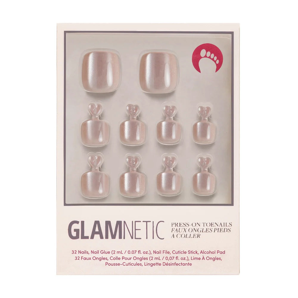 A box of Glamnetic press-on toenails in a champagne shimmer finish with subtle sparkle.