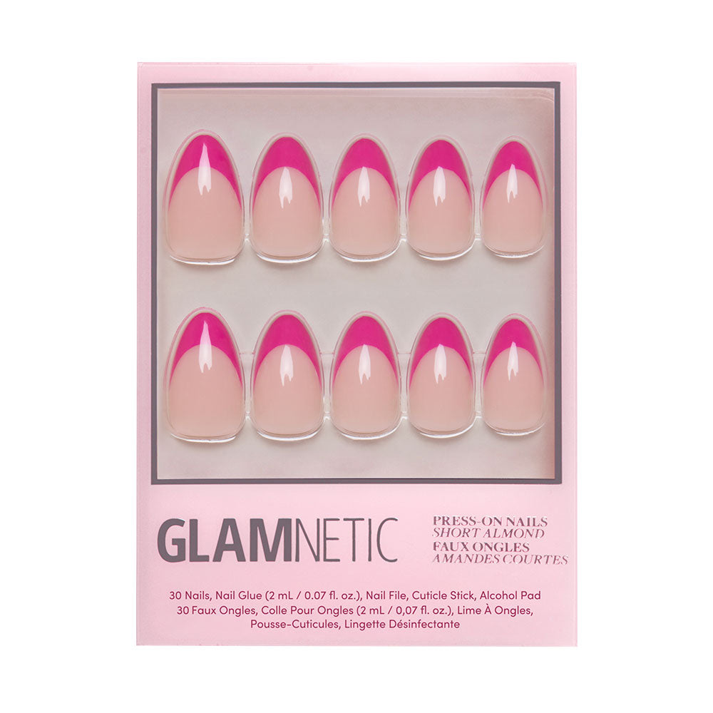 The glamnetic Raspberry Sorbet set features almond-shaped press-on nails in nude with magenta-pink French tips. Each box includes 30 nails, nail glue, a file, cuticle stick, and alcohol pad.
