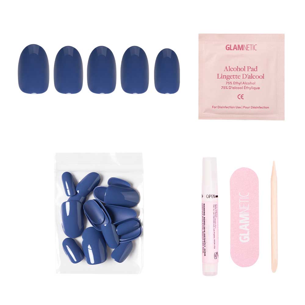 Regal Blue press-on nails set, including a glossy finish, alcohol pad, extra nails, nail glue, pink nail file, and wooden cuticle stick—everything for a vegan & cruelty-free manicure on a white background.