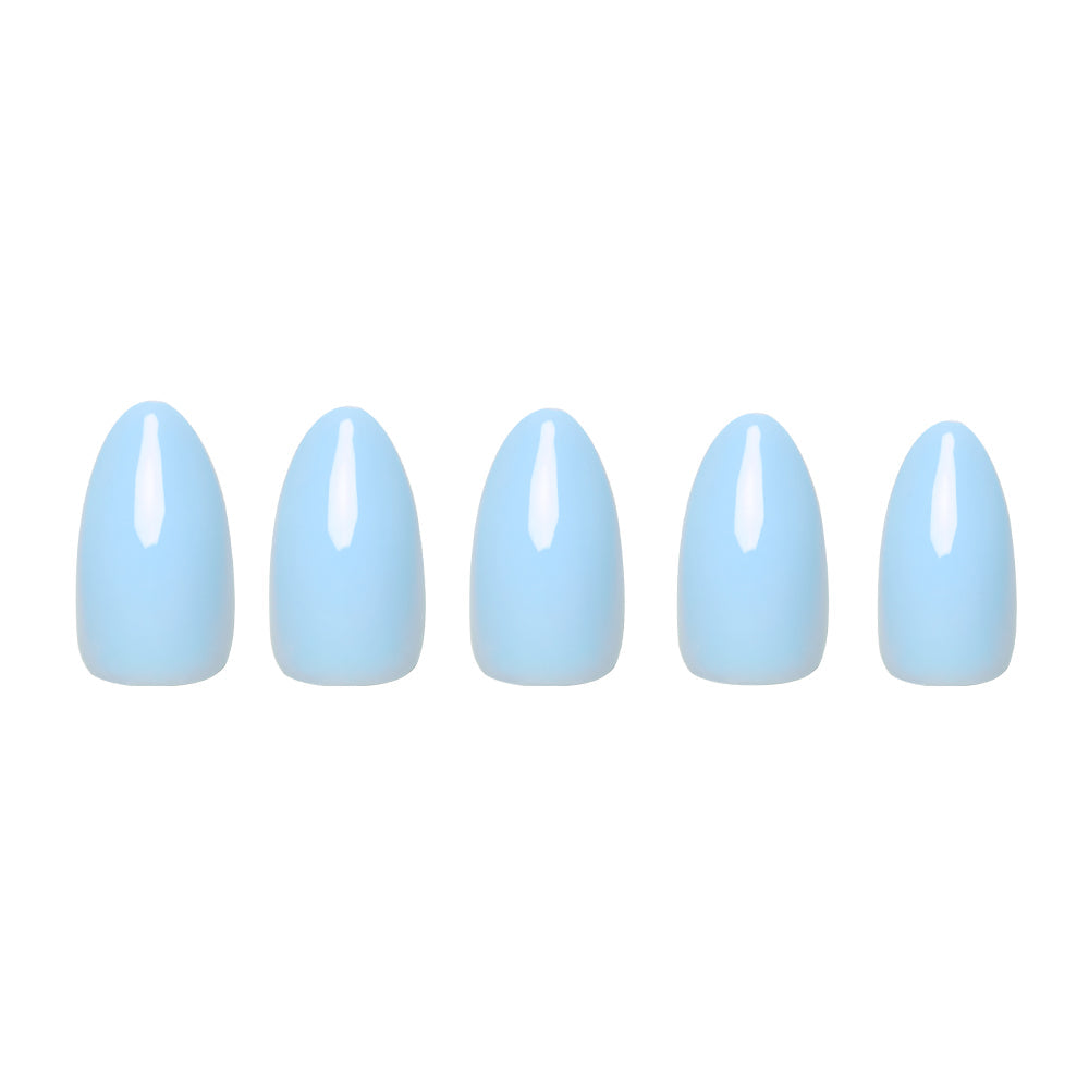 Five short almond-shaped glamnetic Soft Blue artificial nails with a glossy pastel blue finish are arranged neatly in a row, creating a beautiful contrast against the white background.