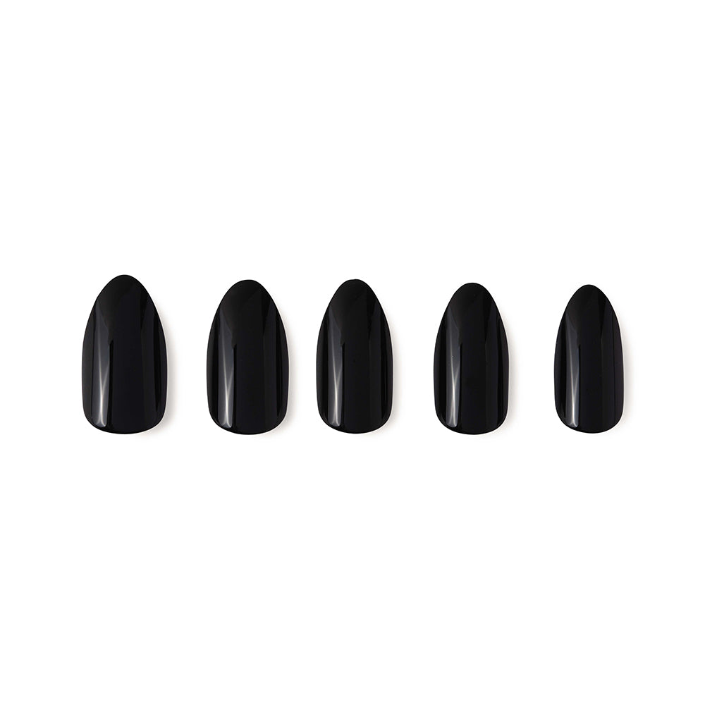 Five glossy black glamnetic Boba press-on nails are arranged in a row on a white background, highlighting their sleek almond-shaped design.